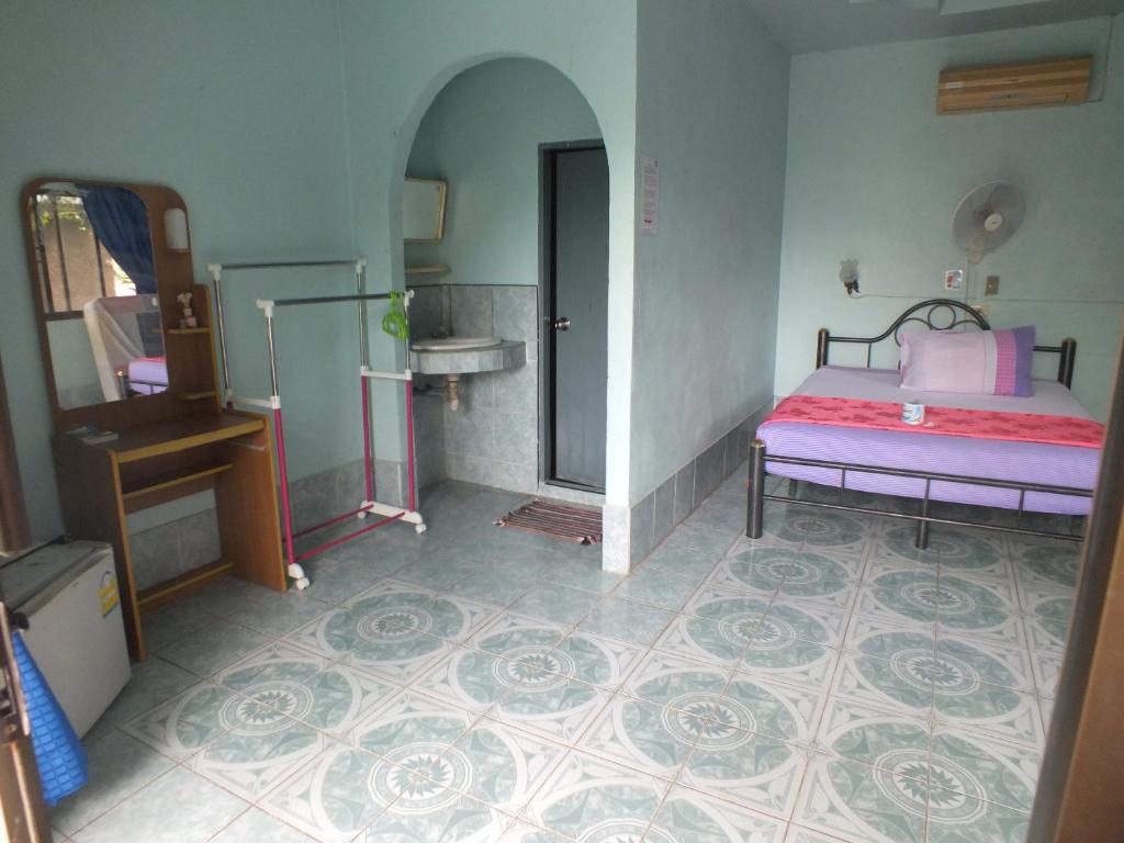 Postel nebo postele na pokoji v ubytování Queen Resort Koh Tao