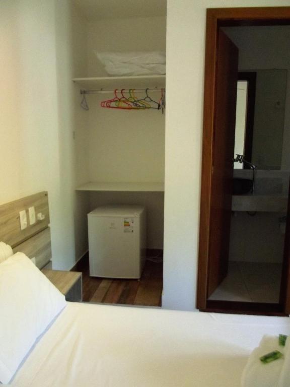 Postel nebo postele na pokoji v ubytování Pousada Miracolo