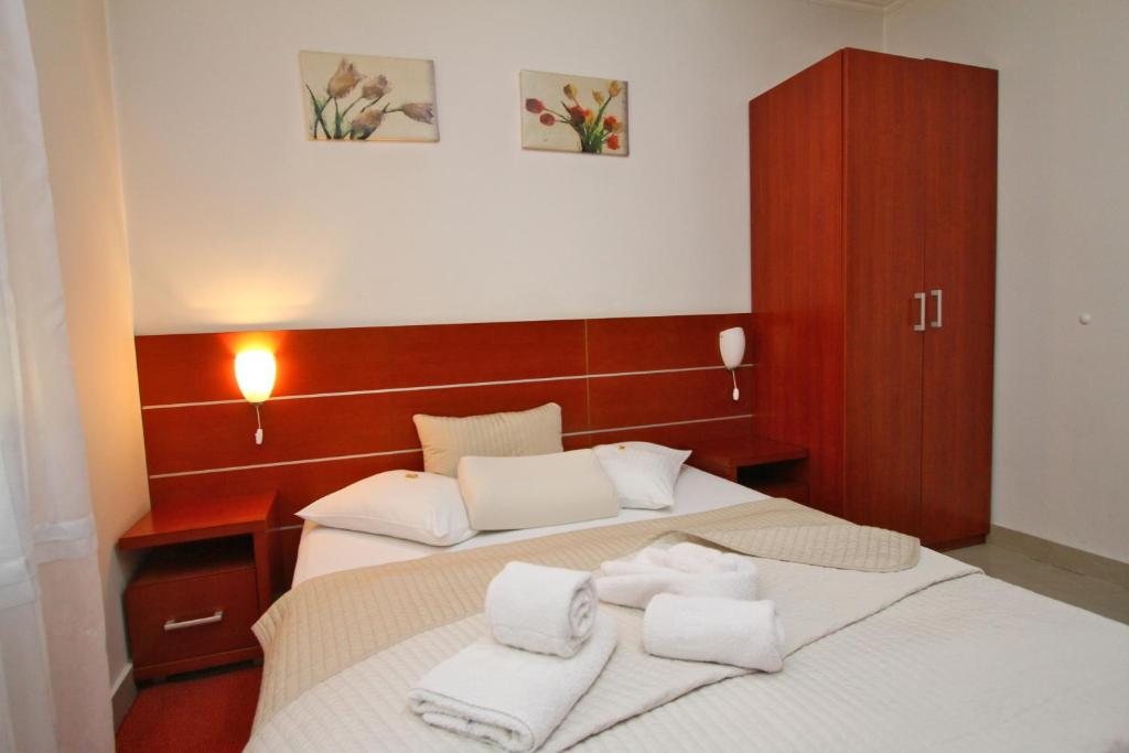 Postel nebo postele na pokoji v ubytování Guesthouse Villa Inn