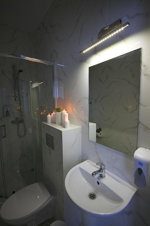 Koupelna v ubytování Willa Park Apartamenty