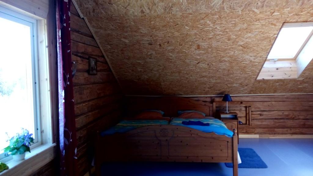 Postel nebo postele na pokoji v ubytování Villa Moni