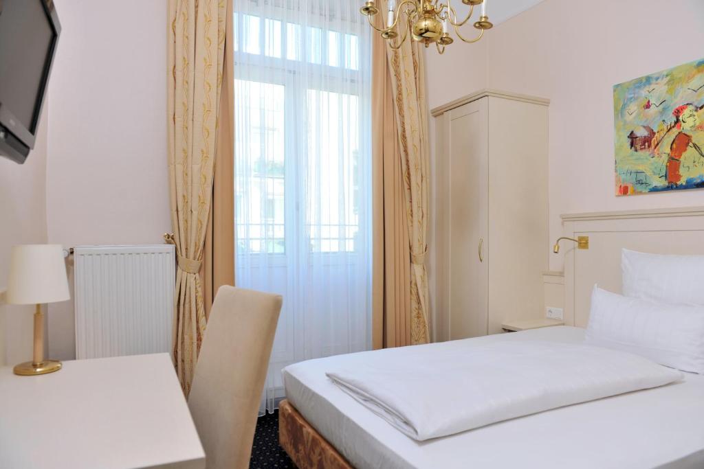 Cama o camas de una habitación en Hotel Fürst Bismarck