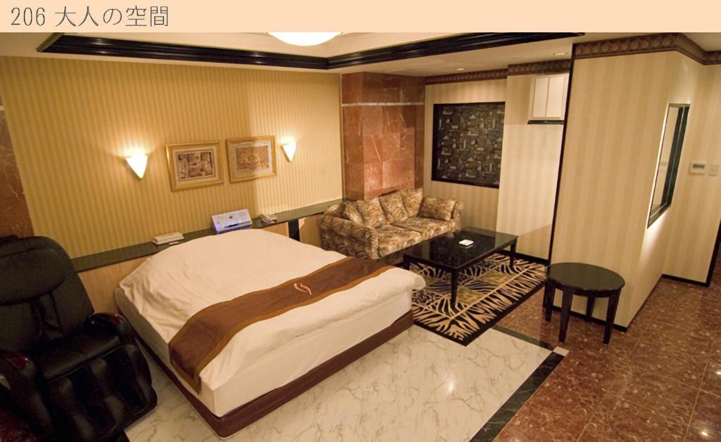 Postel nebo postele na pokoji v ubytování Hotel Very Matsusaka (Adult Only)