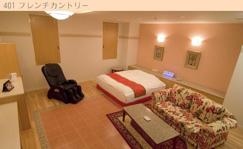 Postel nebo postele na pokoji v ubytování Hotel Very Matsusaka (Adult Only)