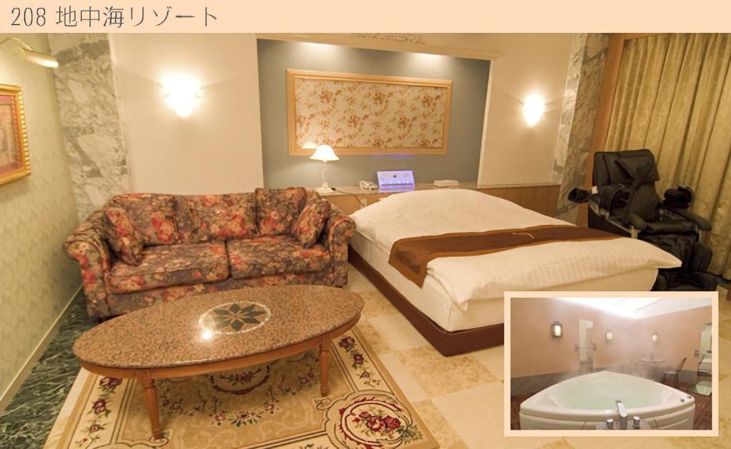 Postel nebo postele na pokoji v ubytování Hotel Very Matsusaka (Adult Only)