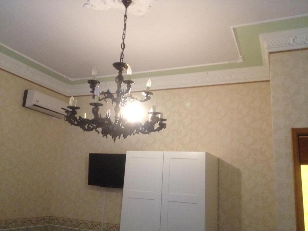 A television and/or entertainment centre at IL B&B Maison Graziella