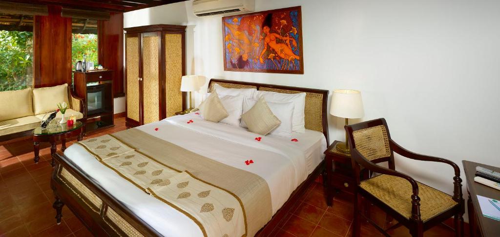 Postel nebo postele na pokoji v ubytování Ragamaya Resort & Spa Munnar