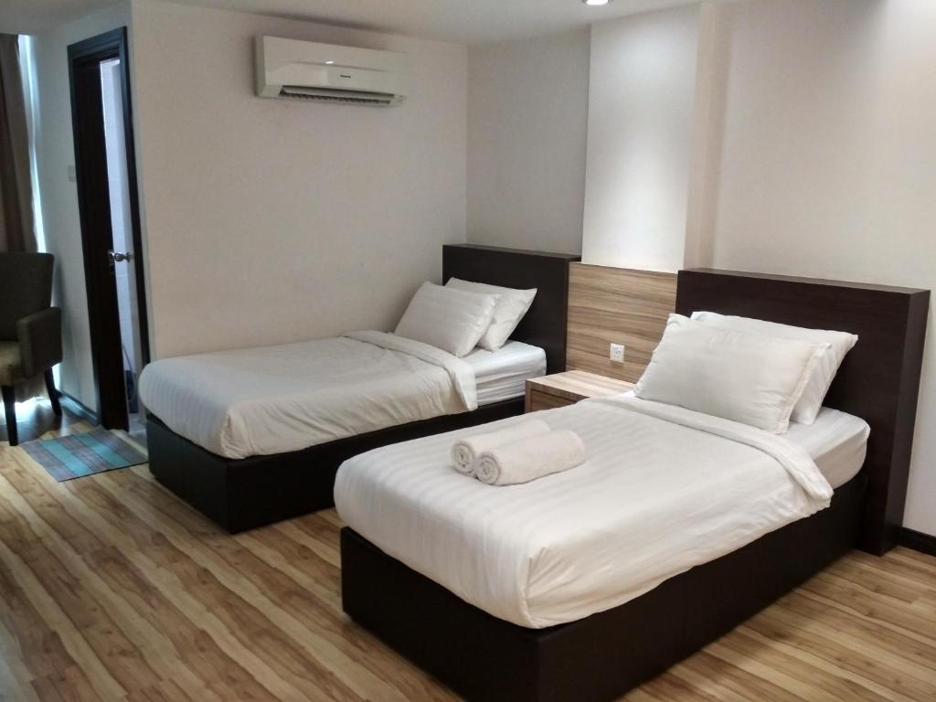 Postel nebo postele na pokoji v ubytování Classy Studio Apartment (KBCP)