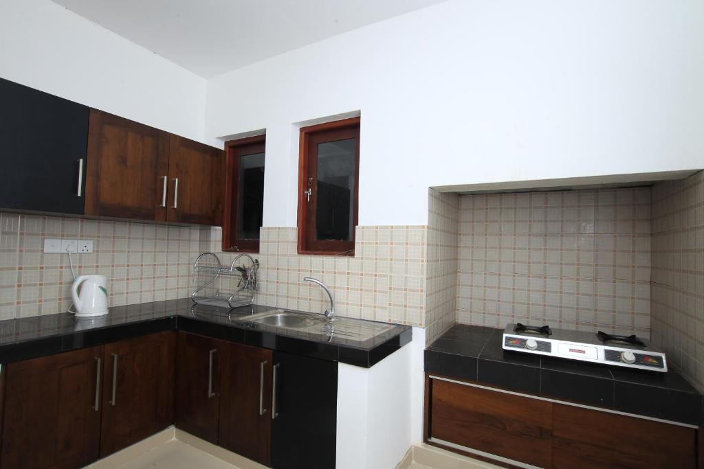 Kuchyň nebo kuchyňský kout v ubytování Breezy Villa