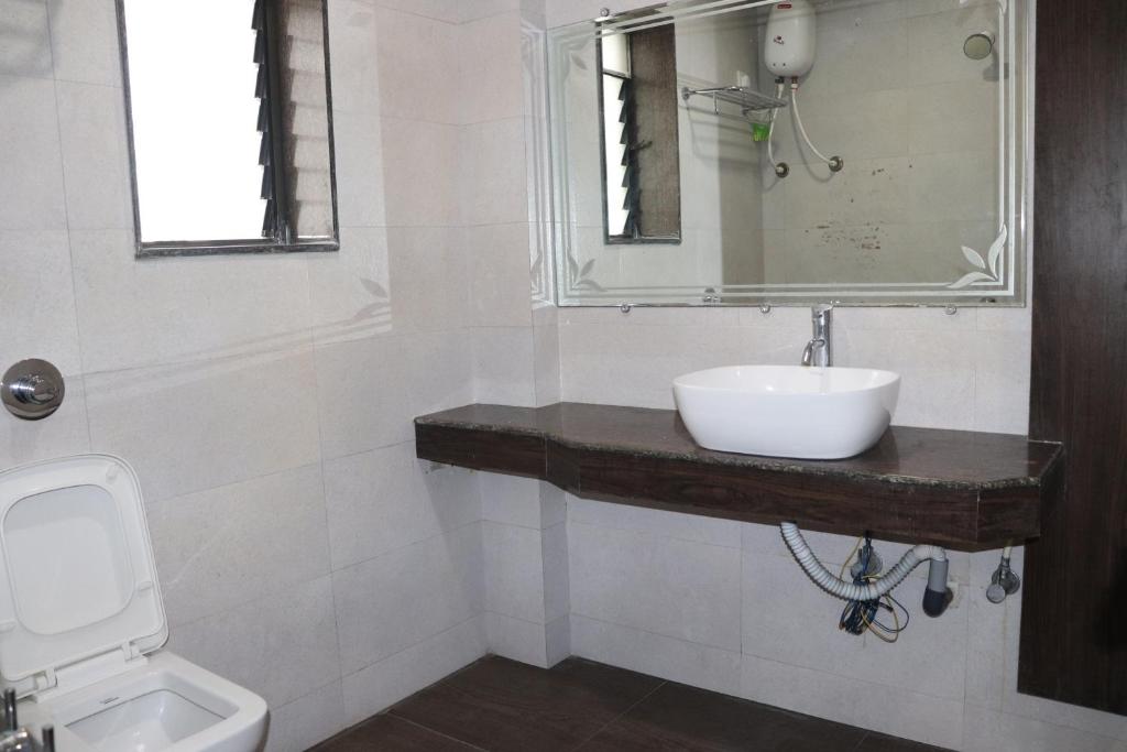 Koupelna v ubytování Hotel Sai Shubham