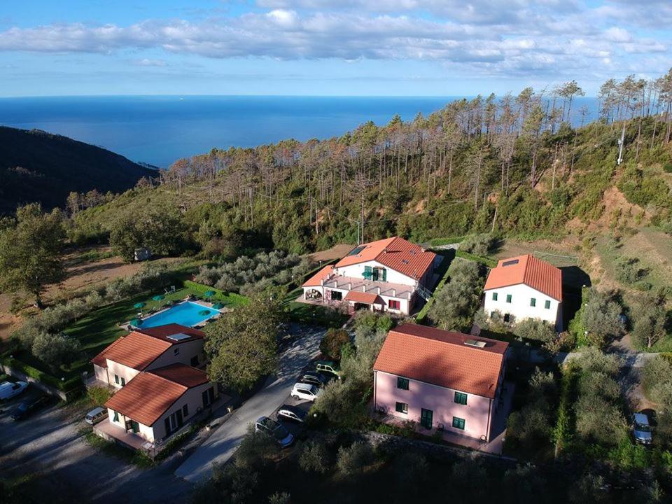 an aerial view of a house with a swimming pool at Hotel La Rossola Resort & Natura in Bonassola