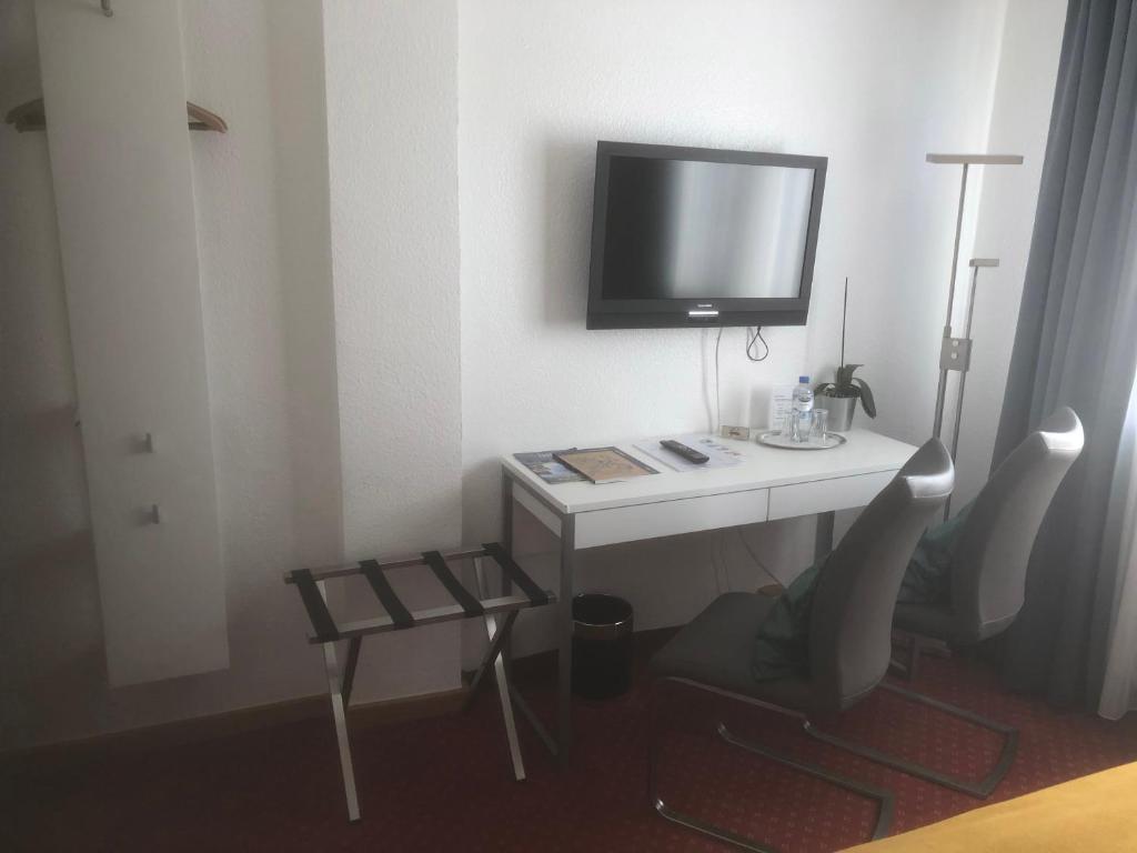 TV a/nebo společenská místnost v ubytování Hotel Sechzehn