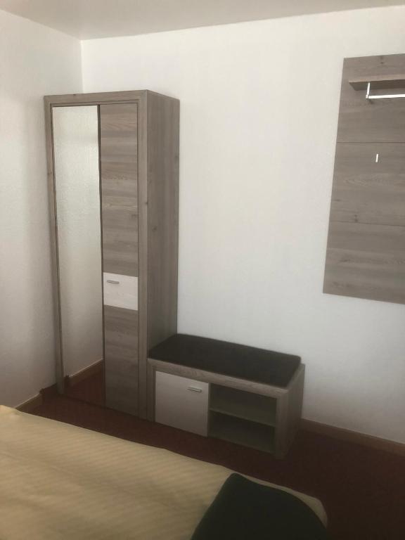 Postel nebo postele na pokoji v ubytování Hotel Sechzehn