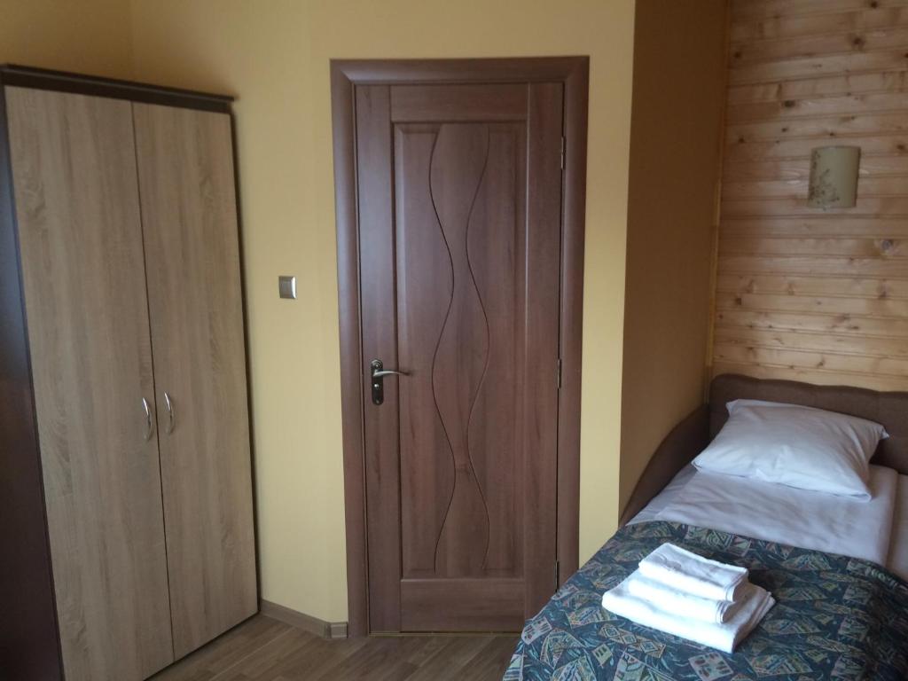 Postel nebo postele na pokoji v ubytování Camelot
