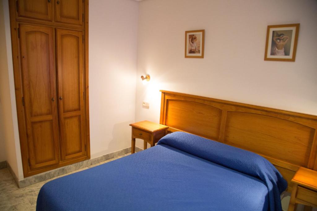 Postel nebo postele na pokoji v ubytování Hostal Acuario