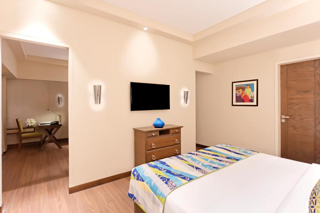TV a/nebo společenská místnost v ubytování Fortune Park Pushpanjali, Durgapur - Member ITC Hotels' Group