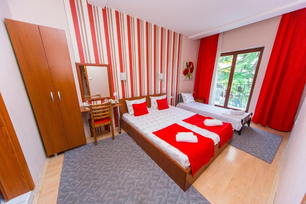 Postel nebo postele na pokoji v ubytování Hotel Pine