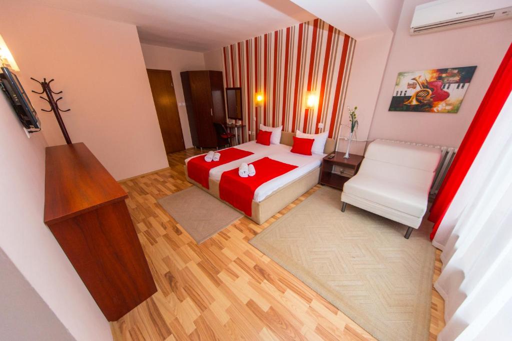 Postel nebo postele na pokoji v ubytování Hotel Pine