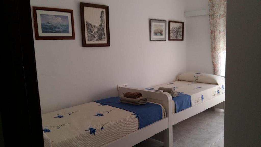 A bed or beds in a room at La Casa De La Tia