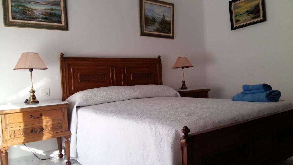 A bed or beds in a room at La Casa De La Tia