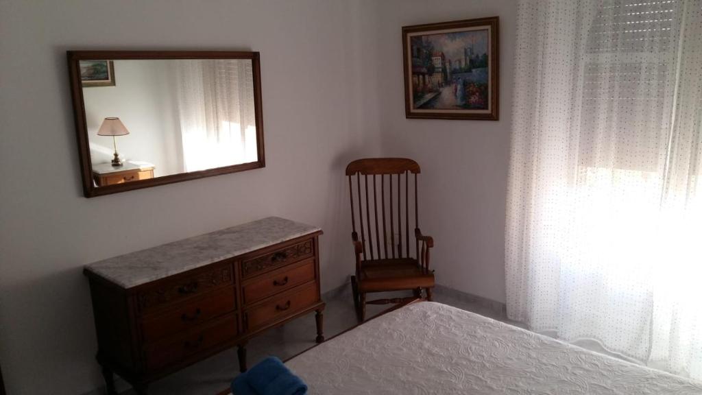 A bed or beds in a room at La Casa De La Tia