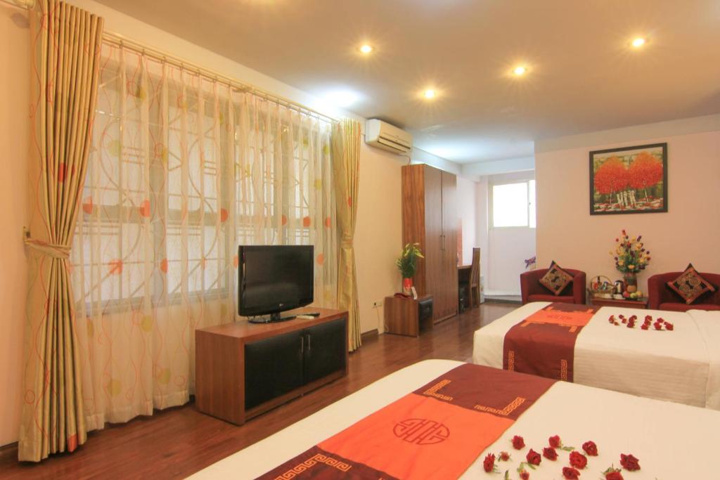 TV a/nebo společenská místnost v ubytování Urban Alley Hotel