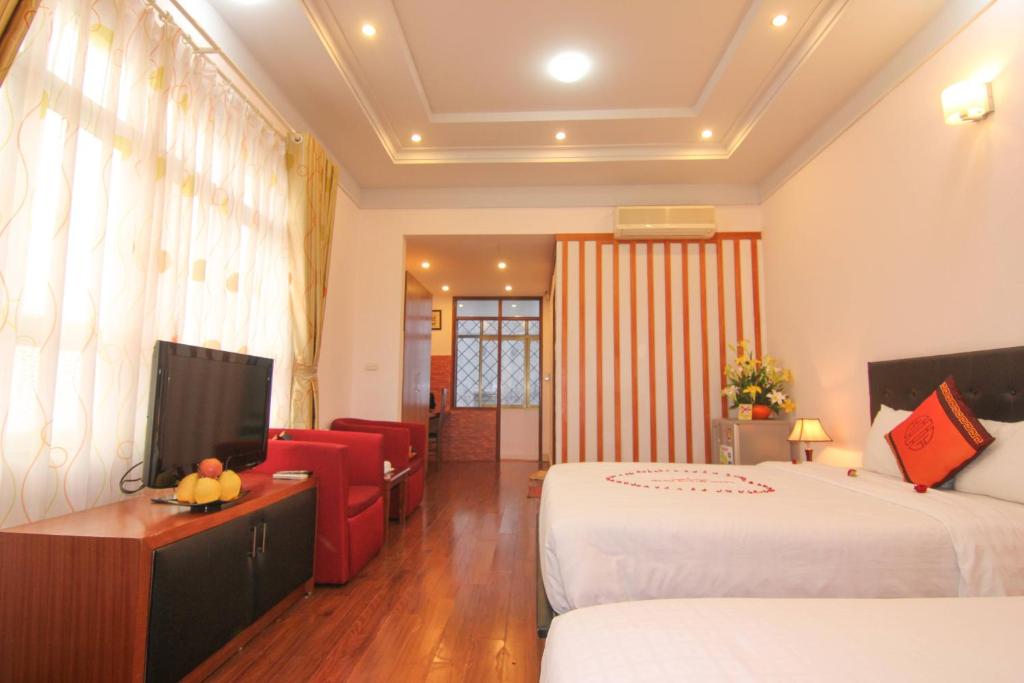 Postel nebo postele na pokoji v ubytování Urban Alley Hotel