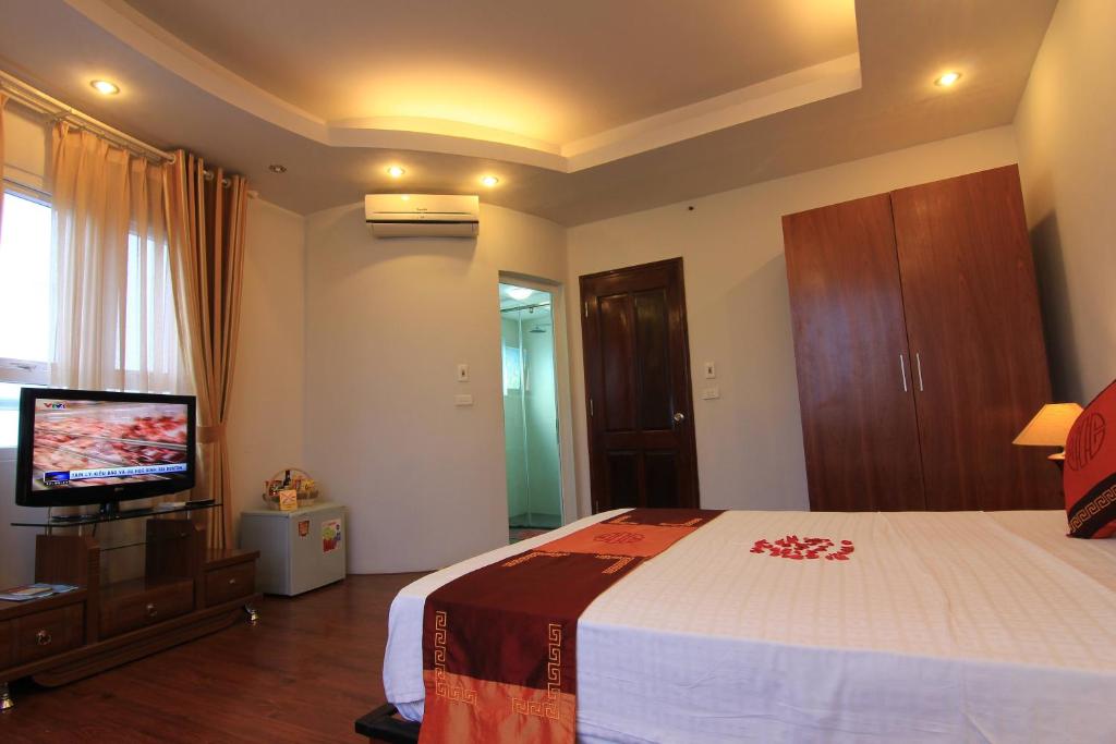 TV a/nebo společenská místnost v ubytování Urban Alley Hotel