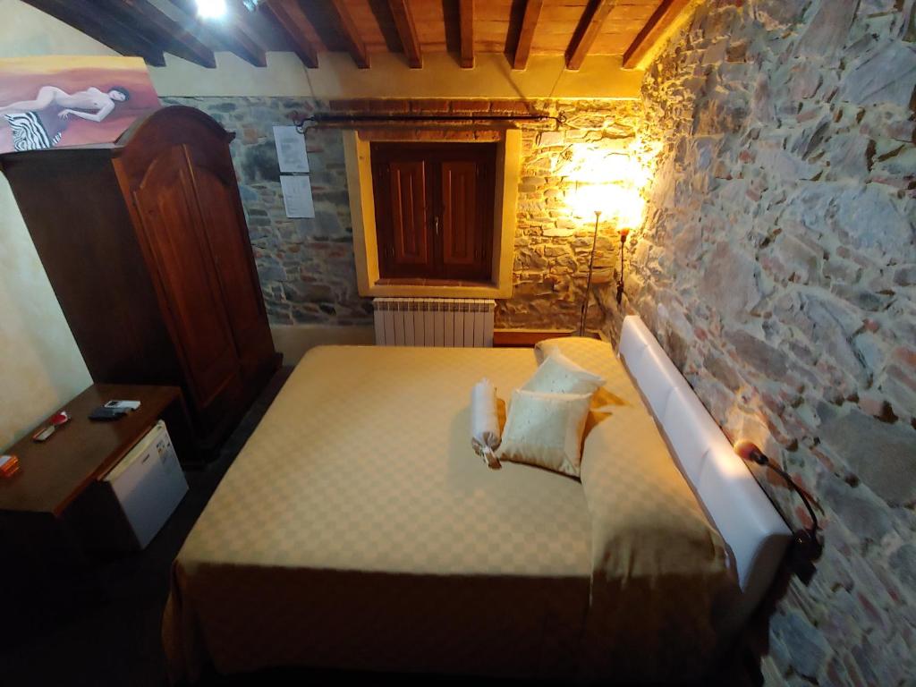 Postel nebo postele na pokoji v ubytování Tangohotel