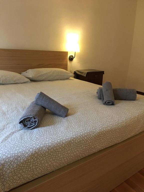 Postel nebo postele na pokoji v ubytování Albergo Ristorante Belcantone