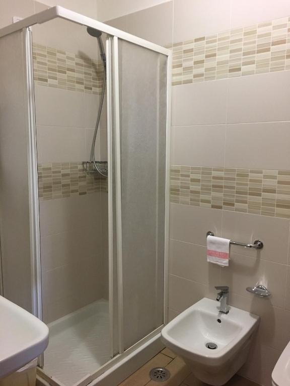 Koupelna v ubytování Hotel Sporting