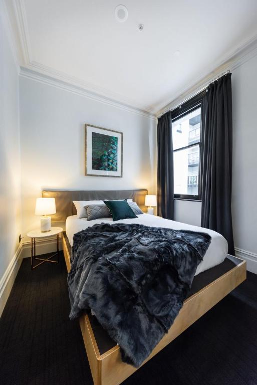 Postel nebo postele na pokoji v ubytování East Brunswick Hotel