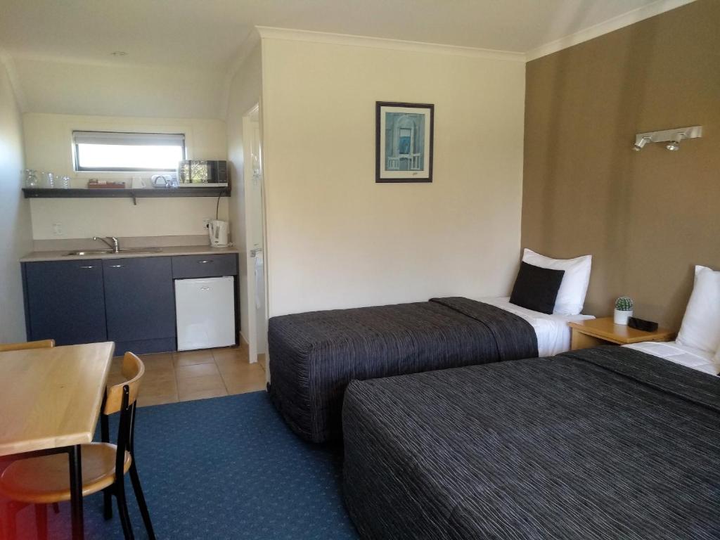 Kuchyň nebo kuchyňský kout v ubytování Stadium Motel