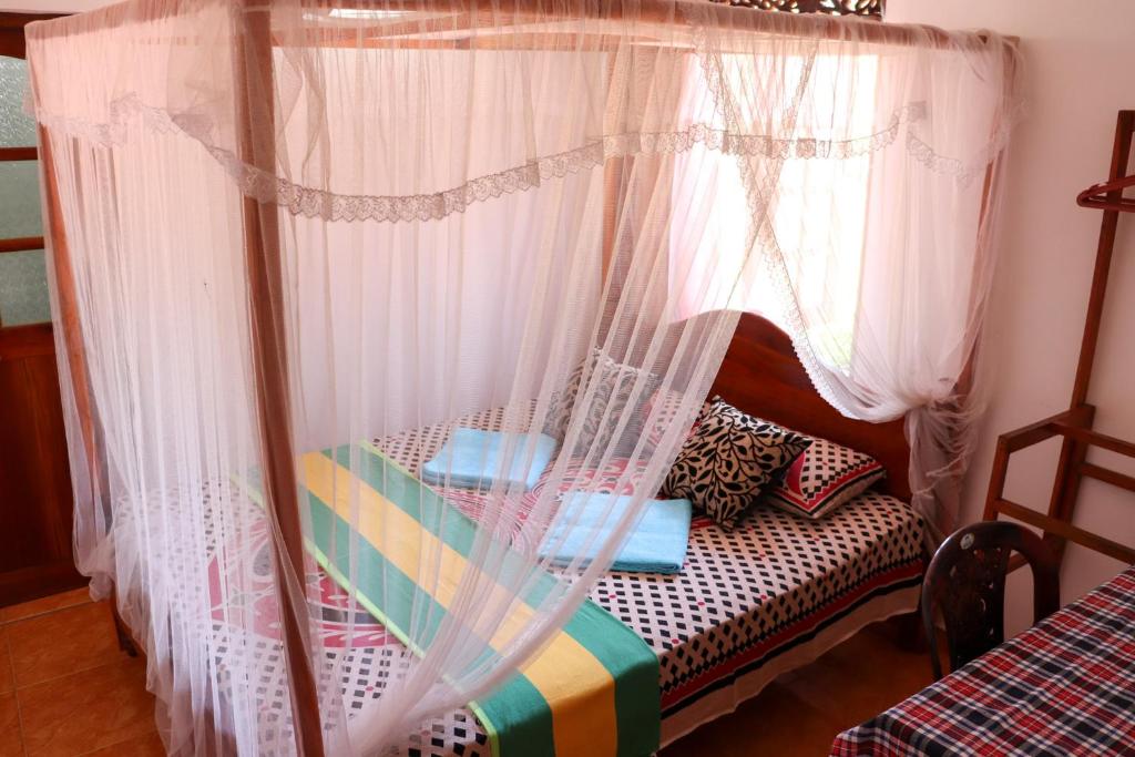 Postel nebo postele na pokoji v ubytování Sun Hopes