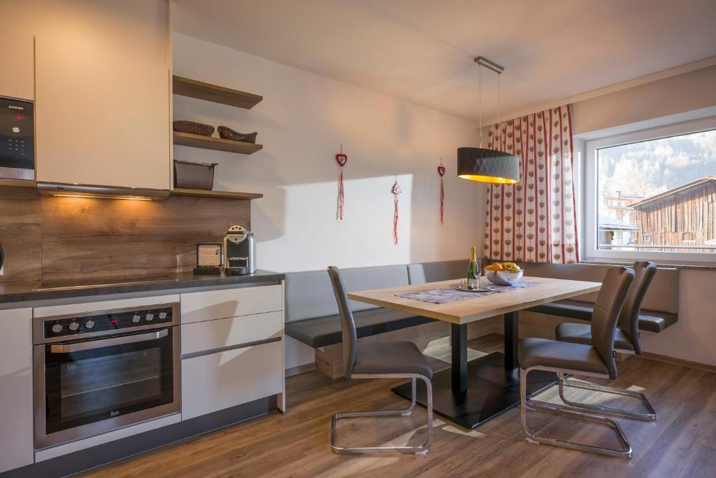 Kuchyň nebo kuchyňský kout v ubytování Aparthotel AlpTirol