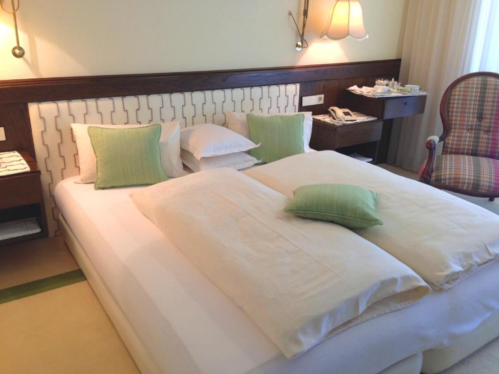 Letto o letti in una camera di Dietrichsteinerhof Apartments & Rooms