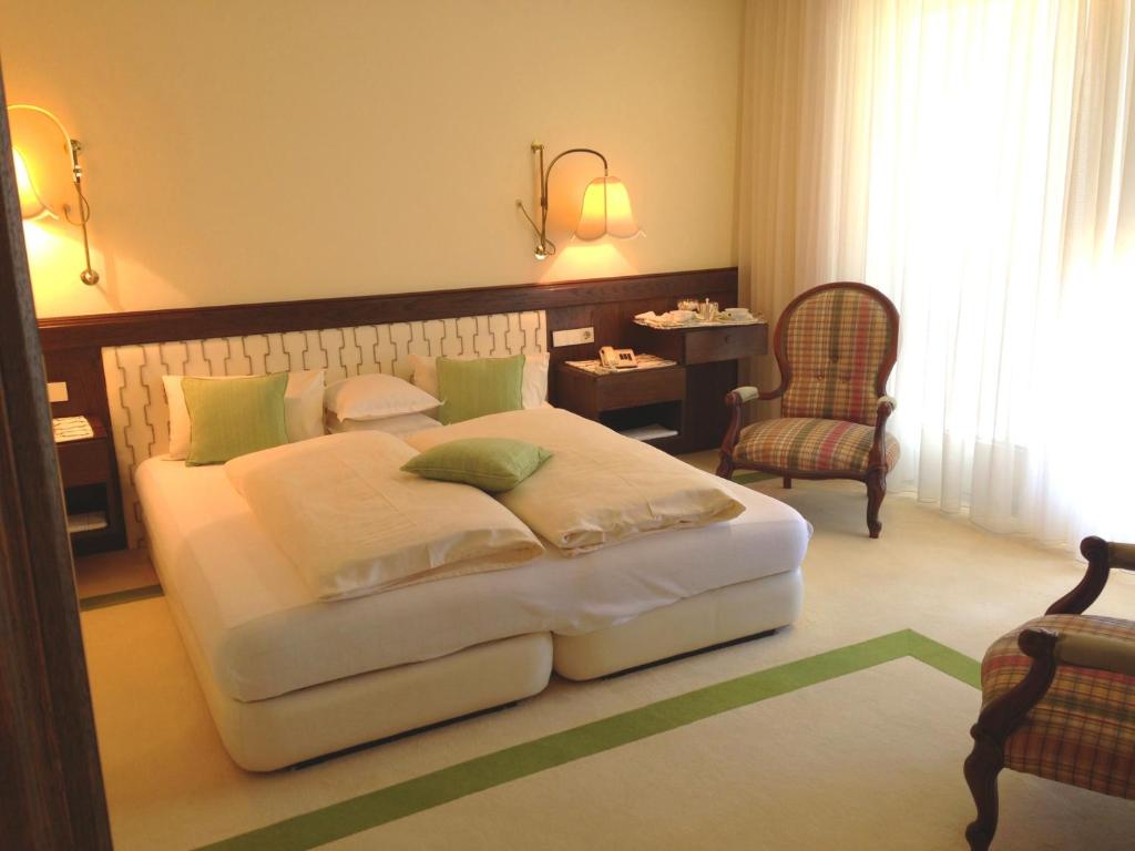 Letto o letti in una camera di Dietrichsteinerhof Apartments & Rooms