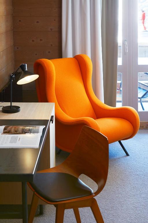 Posezení v ubytování Les Trois Vallées, a Beaumier hotel