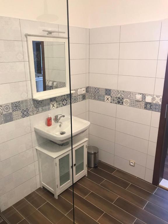 Koupelna v ubytování Portus Apartment