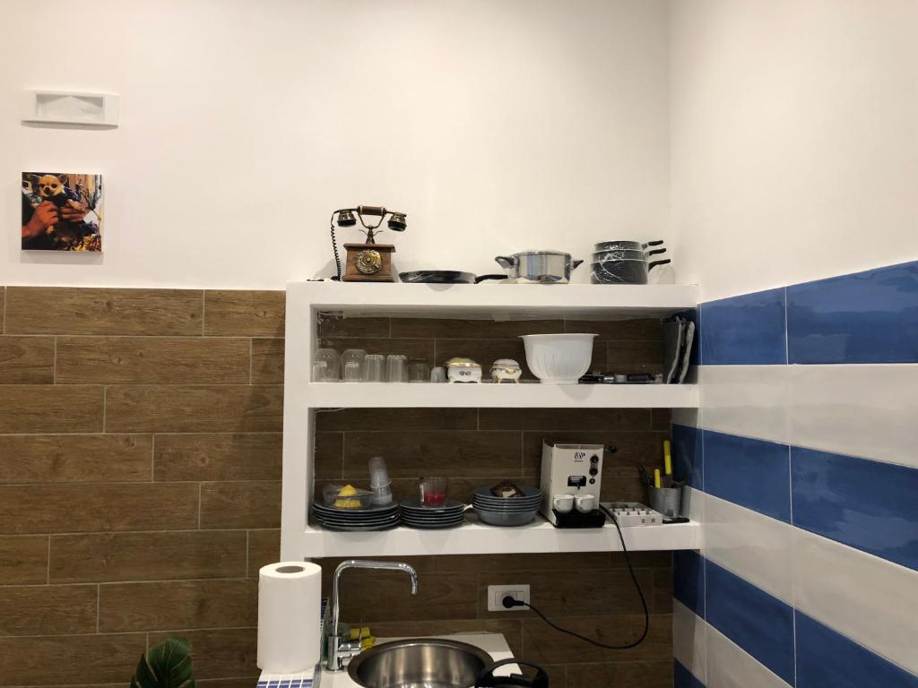 Kuchyň nebo kuchyňský kout v ubytování Casa Vacanze Riva Destra