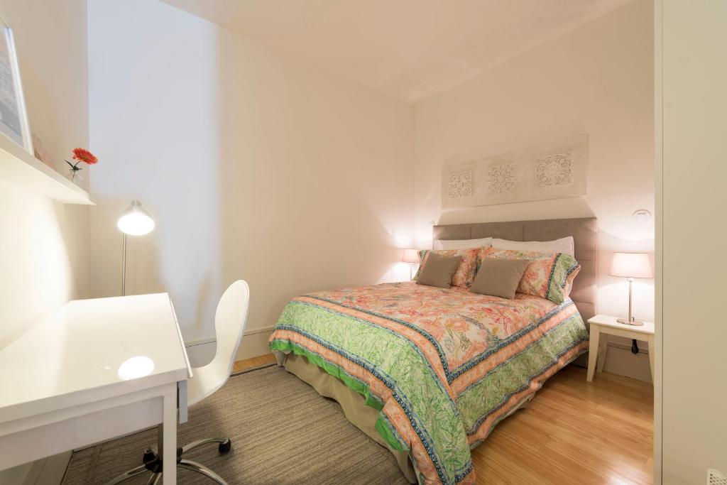 Postel nebo postele na pokoji v ubytování BmyGuest - Villa Lóios Terrace Apartment