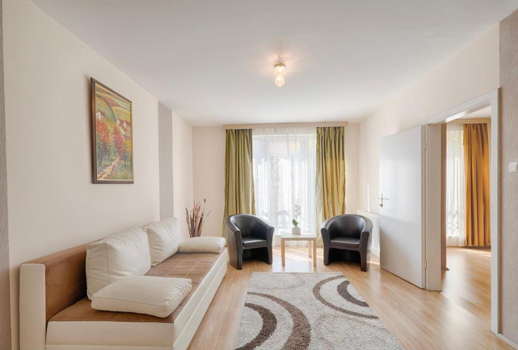 Posezení v ubytování Triple M Hotel