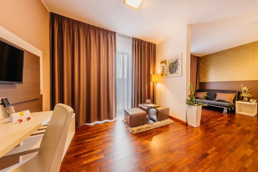 Kuchyň nebo kuchyňský kout v ubytování Maximus Resort