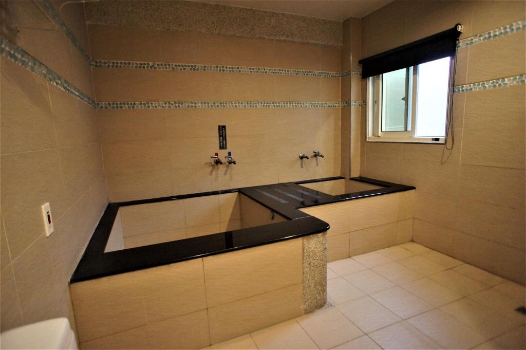 Fotografie z fotogalerie ubytování Xi Xin Guan Hot Spring Resort v destinaci Baihe