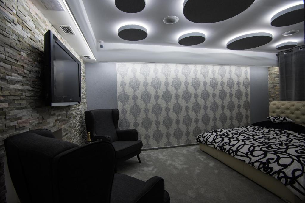 Postel nebo postele na pokoji v ubytování Wellness Apartmán Relax