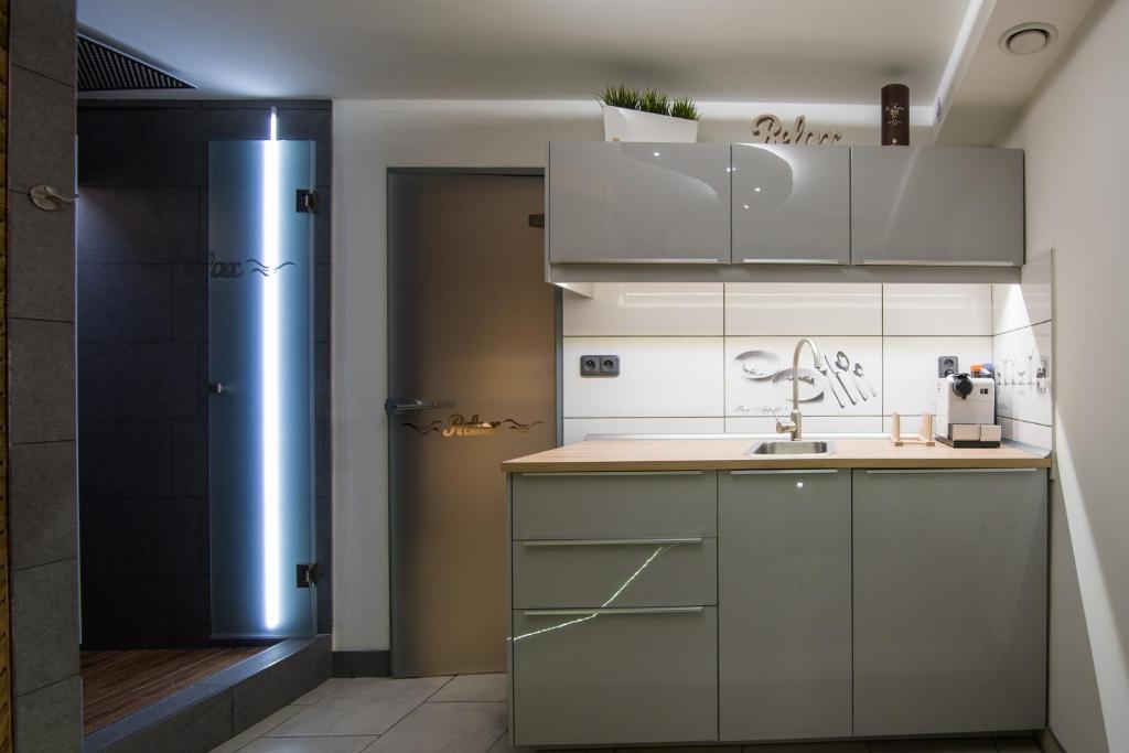 Kuchyň nebo kuchyňský kout v ubytování Wellness Apartmán Relax