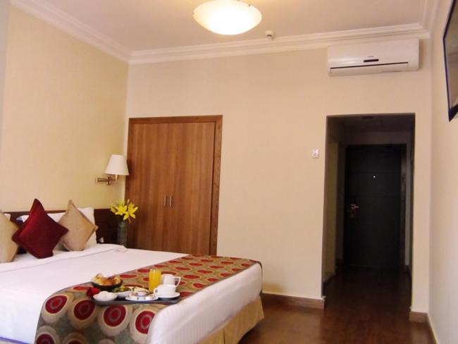 Postel nebo postele na pokoji v ubytování Orient Prince Hotel
