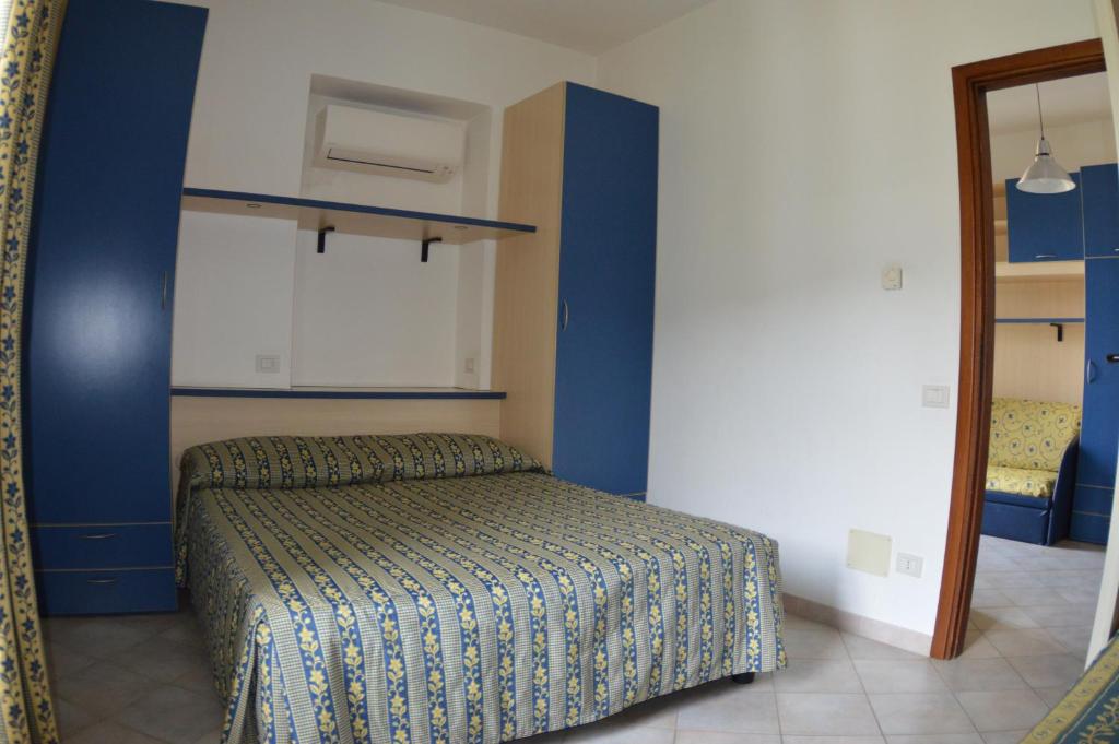 Postel nebo postele na pokoji v ubytování Residence Villa Miky
