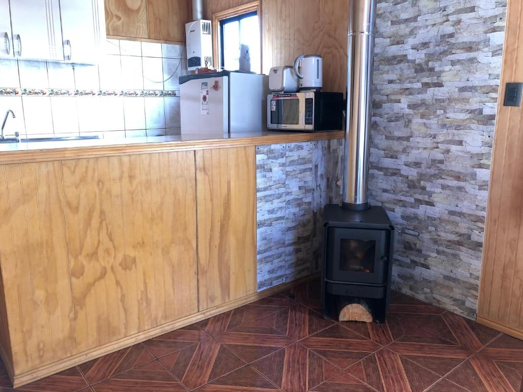Η κουζίνα ή μικρή κουζίνα στο Cabañas Sra. Flor