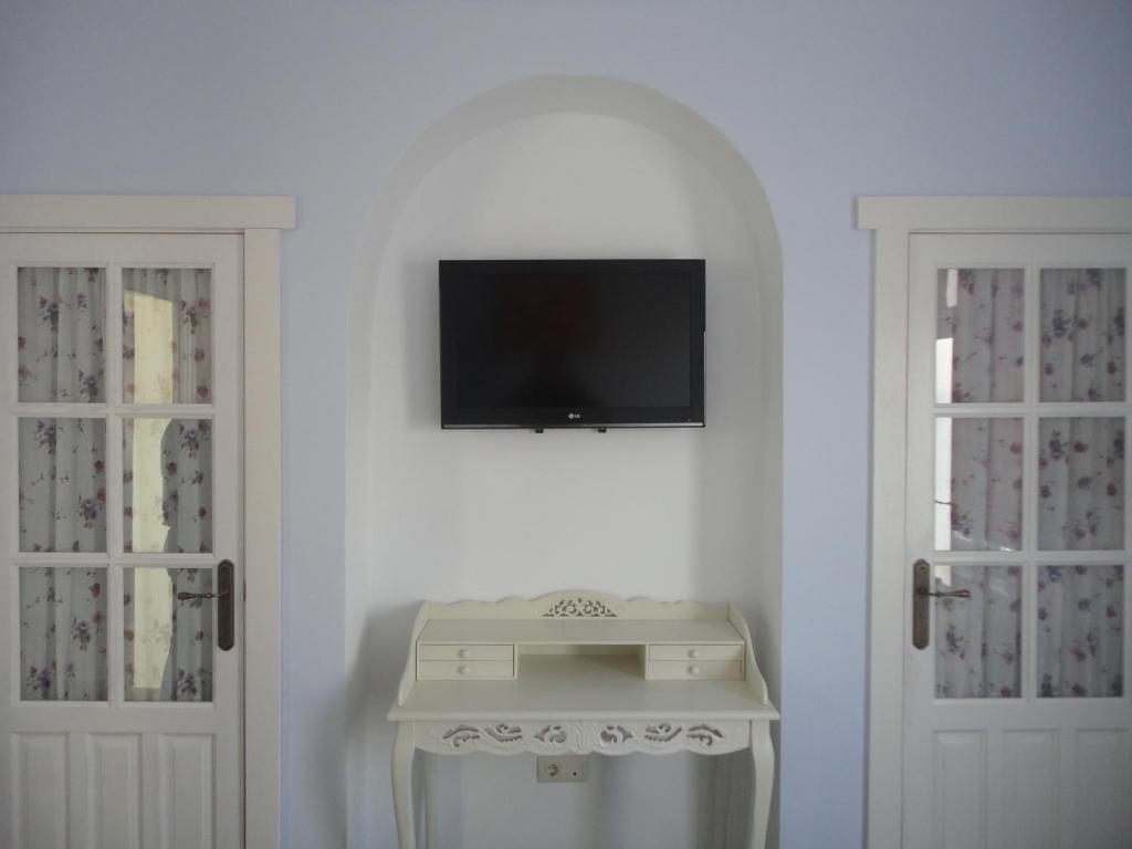 TV a/nebo společenská místnost v ubytování Hotel Rural las Cinco Ranas